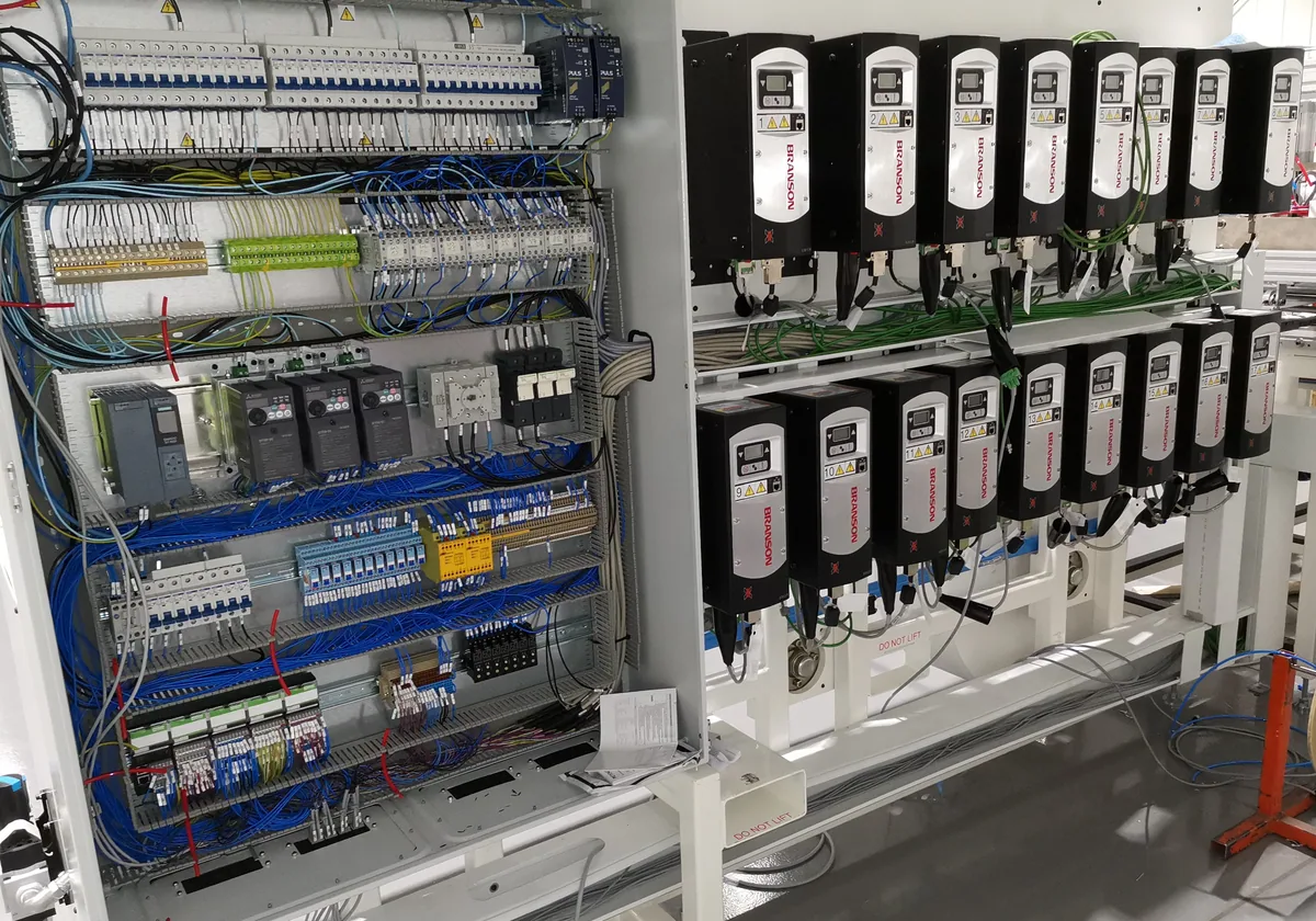 Control cabinet with frequency inverters — control system design